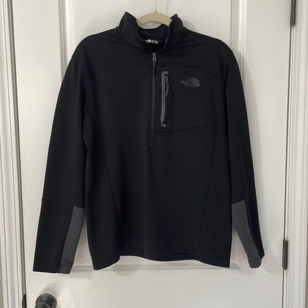 The North Face. Men’s black half-zip. Size large.